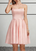 Vestito corto rosa cipria in raso con spalline sottili, schiena allacciata e gonna a trapezio