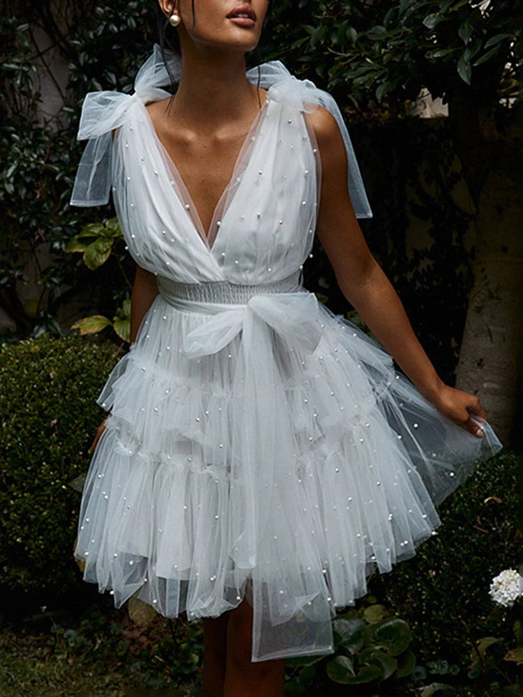 TARUXY Solid Mesh Splice Bow Mini Dress For Women Pearl Sleeveless Sexy Plunge V Neck Solid Elegant Party Evening Dress Female