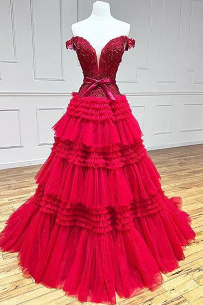 Vestido de fiesta largo rosa claro con volantes y corte princesa en A y hombros descubiertos de Roycebridal