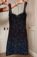 Abito corto da sera nero con paillettes e spalline sottili