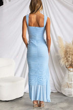 فستان ماكسي من قماش كاستين المنسوج بشبكة وتفاصيل كشكشة مرتفعة ومنخفضة الحاشية مع خاصية التمدد