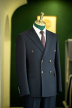 Traje de lana con raya diplomática azul marino de doble botonadura, confeccionado para novios formales y negocios