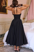 Robe mi-longue trapèze à col en V profond et bretelles fines