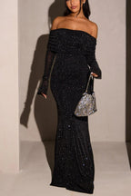 Robe longue noire à sequins avec épaule dénudée