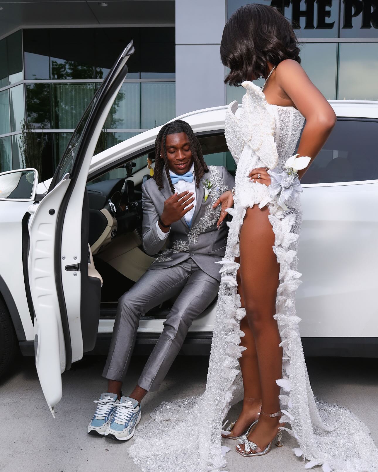 White Butterfly Beaded Gown With Silver Sequins And Oversized Bow Sleeves