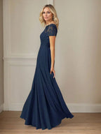 فستان شيفون كحلي داكن برقبة قارب وتطريز بالترتر على شكل حرف A