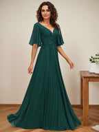 Robe de mère de la mariée en mousseline longueur au sol, coupe en A, col en V, ornée d'appliques en dentelle plissée et de paillettes