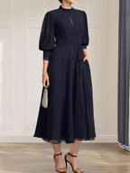 Abito da madre della sposa in chiffon di pizzo, linea a trapezio, collo alto, lunghezza al tè, con fiocco