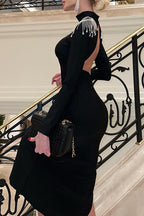 Abito da sera elegante e formale, senza schienale, con spacco, mezza polo e strass, in tinta unita