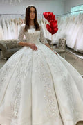 Elegant Satin Floor Length Wedding Dress With Bateau Neckline And Lace Appliques