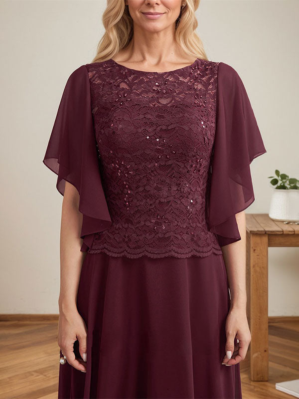 Robe de mère de la mariée en dentelle et mousseline, longueur au sol, coupe en A, décolleté illusion en forme de goutte, ornée de paillettes