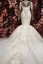 Elegant Sweetheart Mermaid Wedding Dress With Lace Appliques And Beading