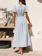 Vestido largo con escote en V y mangas abullonadas y dobladillo extragrande 