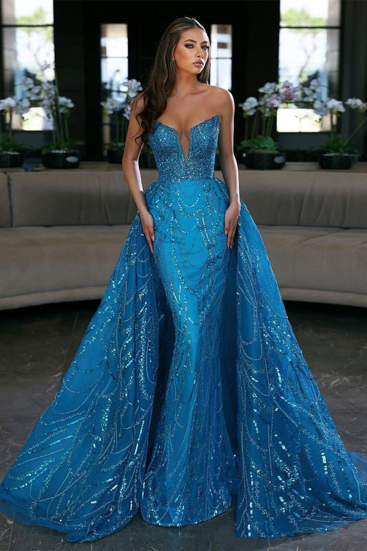 Vestido de noche sin tirantes, sin mangas y adornado con lentejuelas azules y cola desmontable