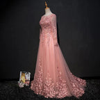 Vestido de baile e de cerimónia cor-de-rosa, em tule, com aplicação, corte evasê chic, decote redondo e comprimento até ao chão Y1177