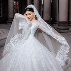 Elegant Beads Long Sleeve Princess Wedding Dress With Tulle And Appliques