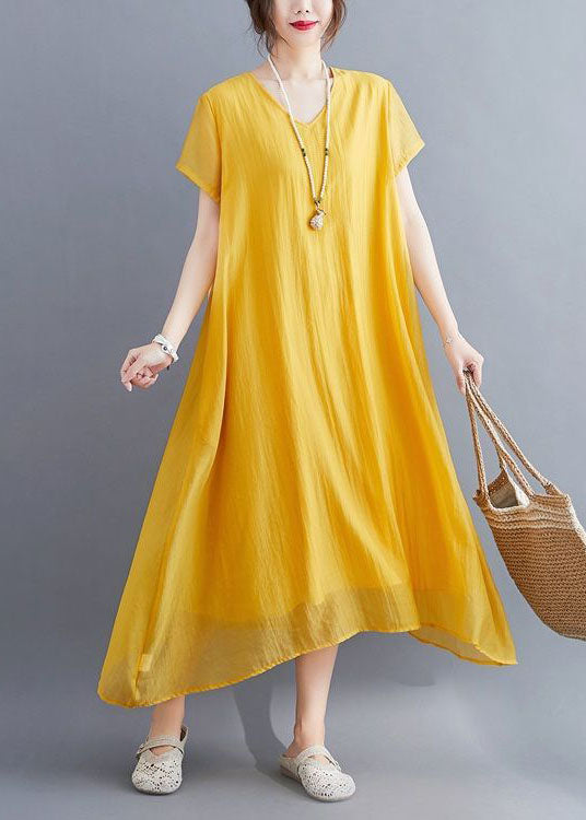 Abito lungo estivo giallo casual in cotone con scollo a V e design asimmetrico