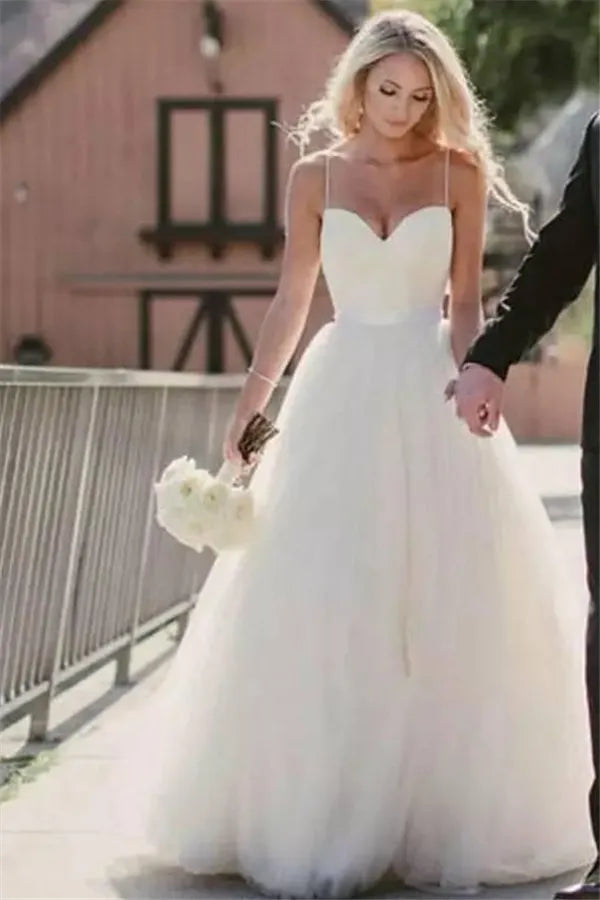 Long Tulle Spaghetti Strap Wedding Dress With Ethereal Silhouette