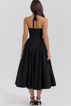 Robe mi-longue trapèze à col en V profond et bretelles fines