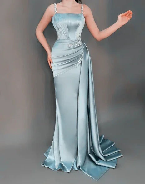 Robe de bal sirène en satin bleu élégant à fines bretelles spaghetti ornée de perles Y8537