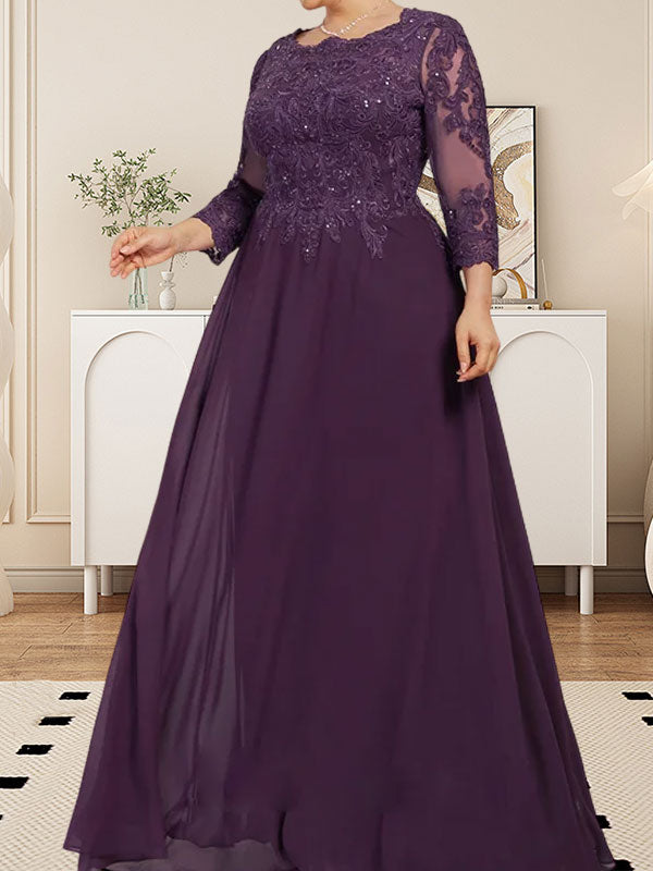 Robe de mère de la mariée en dentelle et mousseline, coupe évasée, décolleté arrondi, longueur au sol, ornée de paillettes