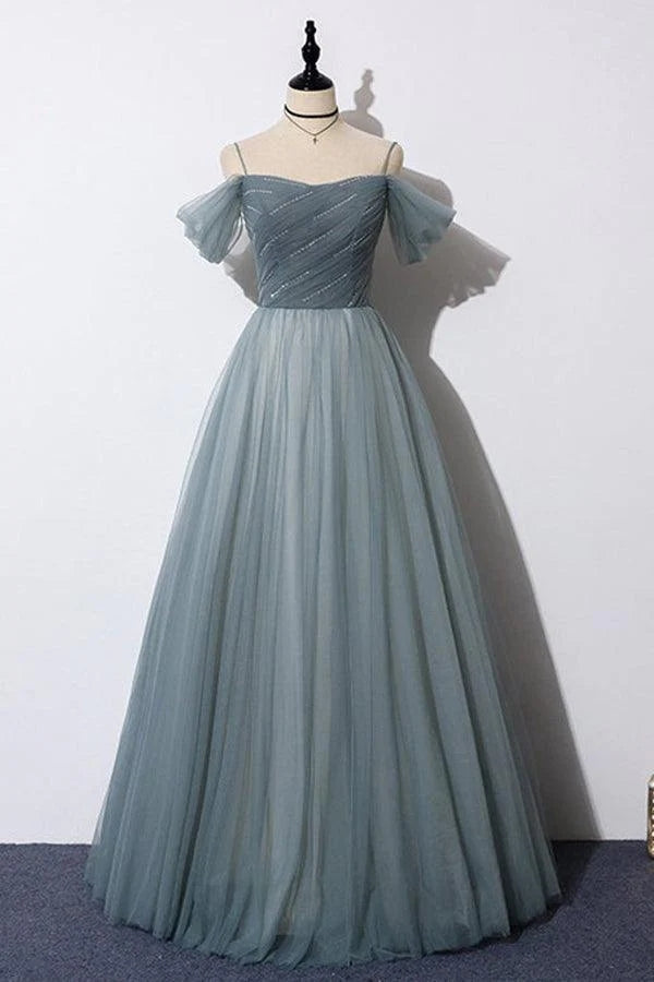 Abito da sera grigio in tulle con scollo a barca e linea a trapezio