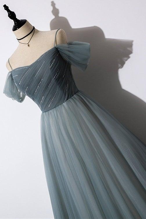 Abito da sera grigio in tulle con scollo a barca e linea a trapezio