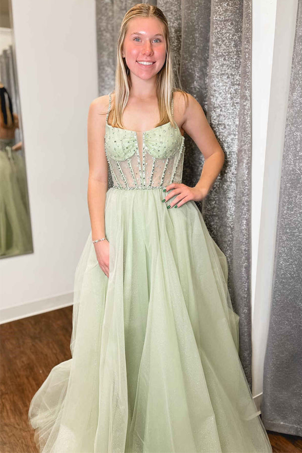 Abito da sera a linea A con spalline verde salvia, paillettes e perline su tulle