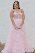 Abito da cerimonia rosa con scollatura profonda, paillettes e pizzo, con spalline a linea ad A