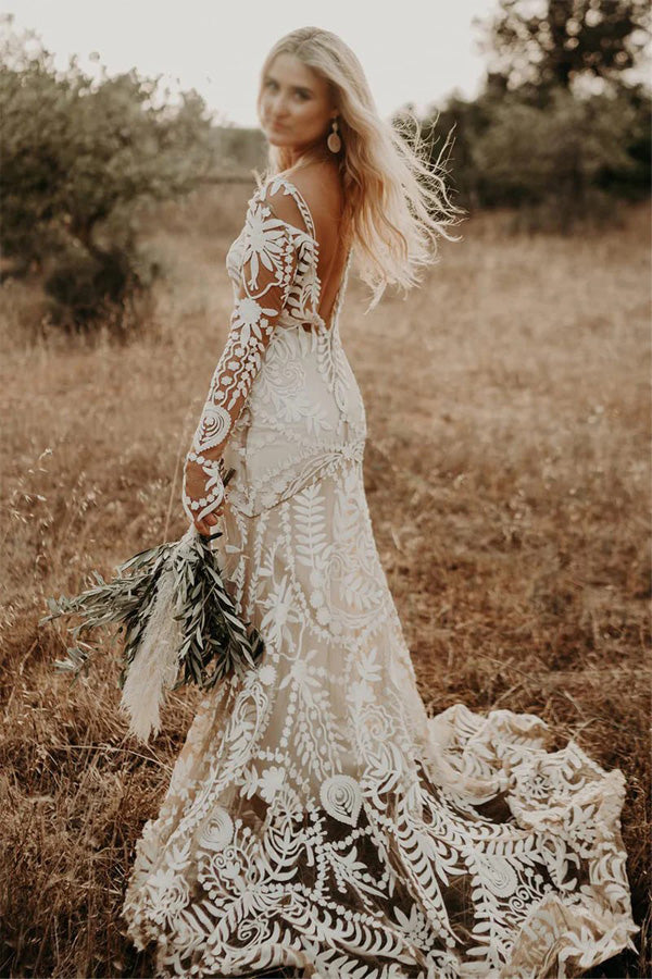 Robe de mariée bohème à manches longues en dentelle unique et ajustée