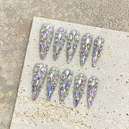 Venta directa de fábrica de uñas postizas artificiales francesas puntiagudas largas con forma de gota de agua, coloridas y brillantes, con diseño de diamantes de imitación. 