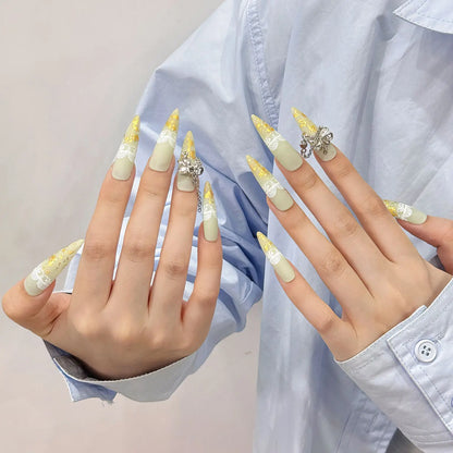 Uñas postizas adhesivas de primera calidad con diseño de gota de agua larga amarilla y diamantes de imitación extraíbles para salón de arte. 
