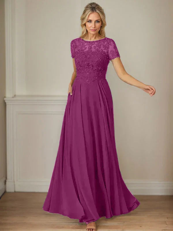 فستان شيفون كحلي داكن برقبة قارب وتطريز بالترتر على شكل حرف A