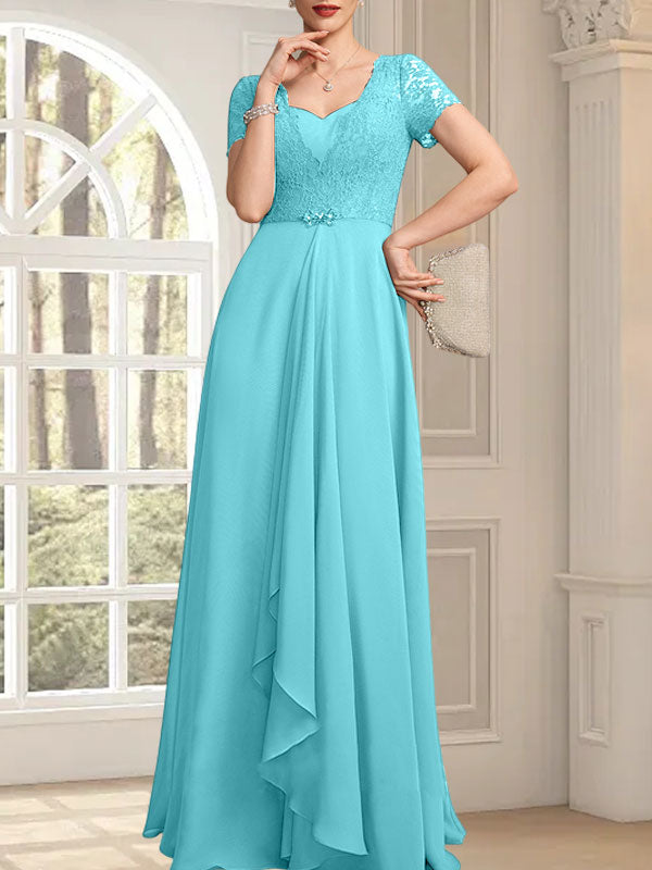 Robe de mère de la mariée en dentelle et mousseline, longueur au sol, taille princesse, décolleté cœur, ornée de perles et de volants en cascade