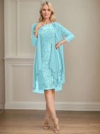 Abito da madre della sposa in pizzo e chiffon con gonna a colonna a effetto illusion fino al ginocchio, con balze a cascata e paillettes