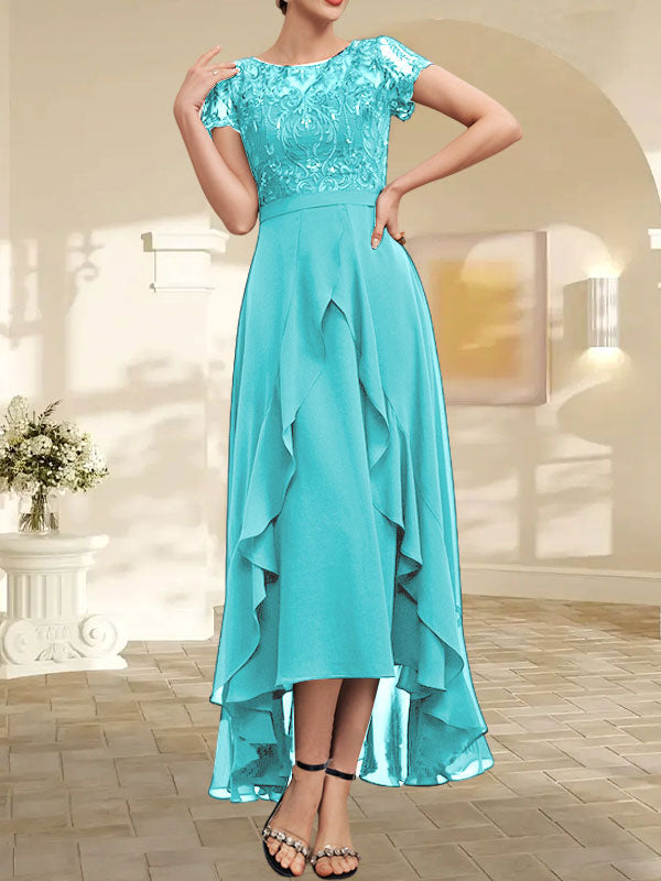 Robe de mère de la mariée en mousseline et dentelle asymétrique illusion à encolure dégagée, coupe en A, avec nœud, volants et paillettes