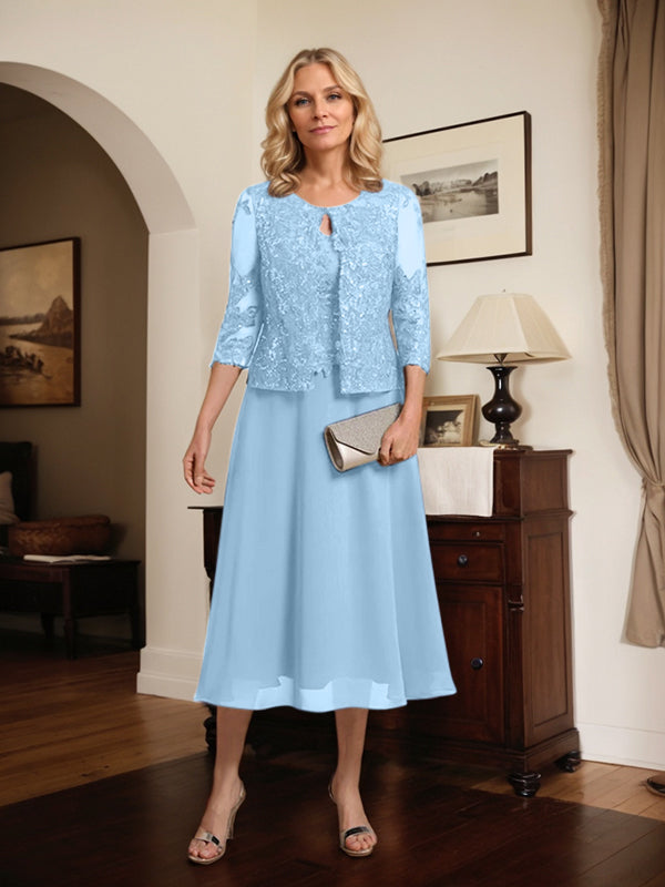 Robe de mère de la mariée en dentelle et mousseline, longueur thé, en ligne A, décolleté arrondi, ornée de paillettes