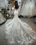 فساتين زفاف دانتيل تول مزينة بتطريزات بدون أكمام بتصميم حورية البحر الجميلة والقلب