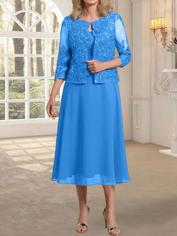 Robe de mère de la mariée en dentelle et mousseline, longueur thé, en ligne A, décolleté arrondi, ornée de paillettes