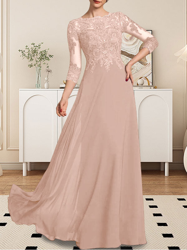 Robe de mère de la mariée en dentelle et mousseline, coupe évasée, décolleté arrondi, longueur au sol, ornée de paillettes