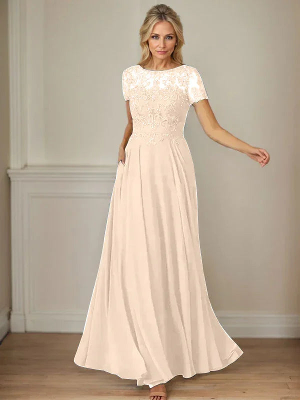 فستان شيفون كحلي داكن برقبة قارب وتطريز بالترتر على شكل حرف A