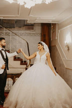 Robe de mariée ivoire longue jusqu'au sol à manches gigot