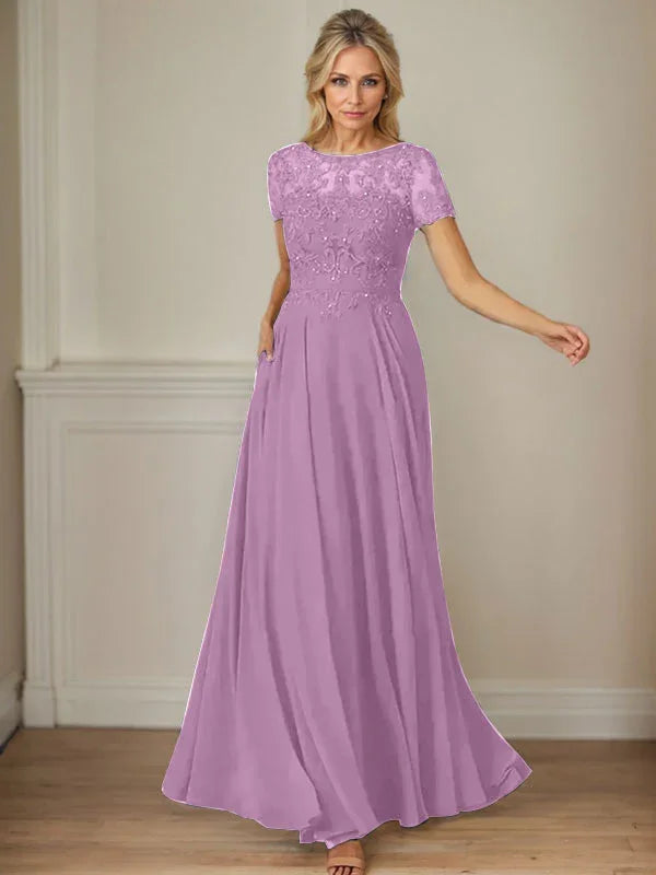 فستان شيفون كحلي داكن برقبة قارب وتطريز بالترتر على شكل حرف A