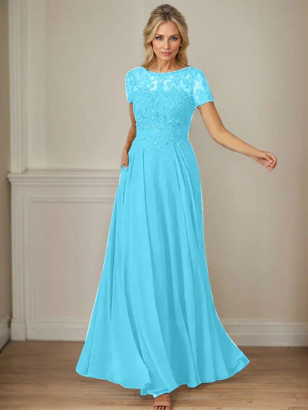 فستان شيفون كحلي داكن برقبة قارب وتطريز بالترتر على شكل حرف A