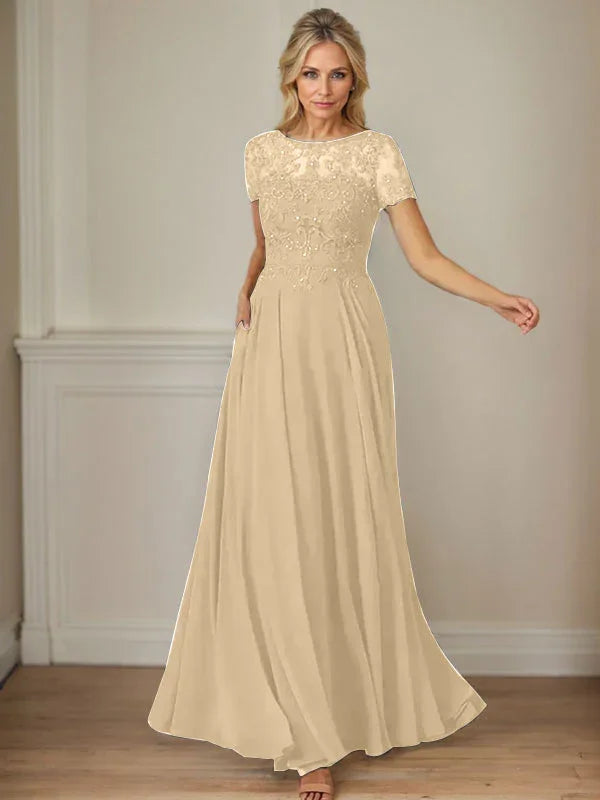 فستان شيفون كحلي داكن برقبة قارب وتطريز بالترتر على شكل حرف A