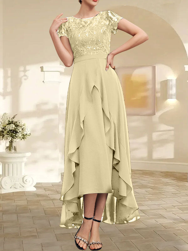 Robe de mère de la mariée en mousseline et dentelle asymétrique illusion à encolure dégagée, coupe en A, avec nœud, volants et paillettes
