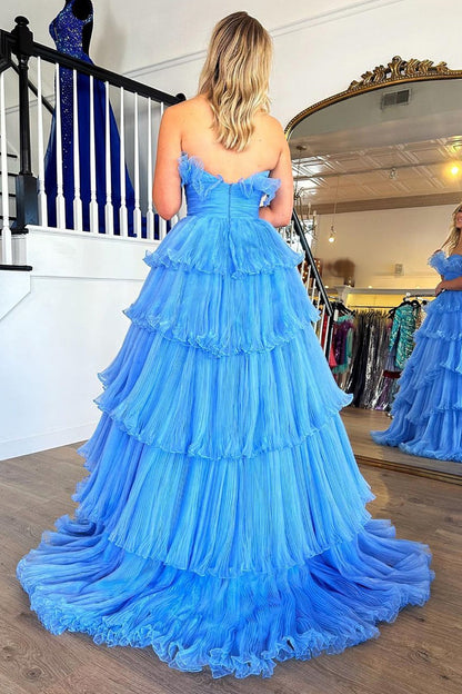 Encantador vestido de fiesta largo azul sin tirantes, corte A y con volantes