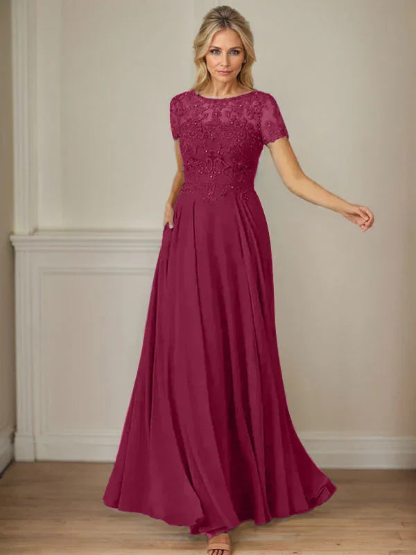 فستان شيفون كحلي داكن برقبة قارب وتطريز بالترتر على شكل حرف A