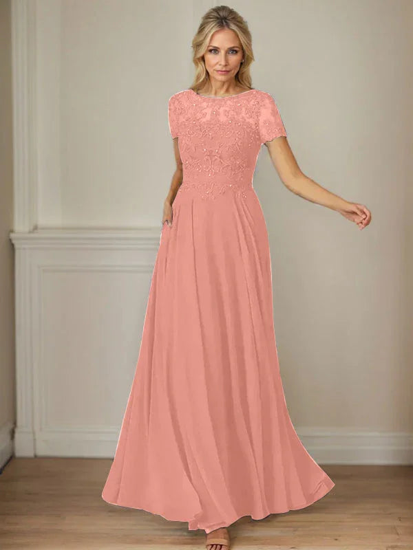 فستان شيفون كحلي داكن برقبة قارب وتطريز بالترتر على شكل حرف A