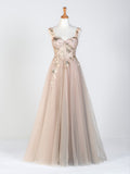 Robe de bal longue en tulle avec corset en dentelle et appliques au sol